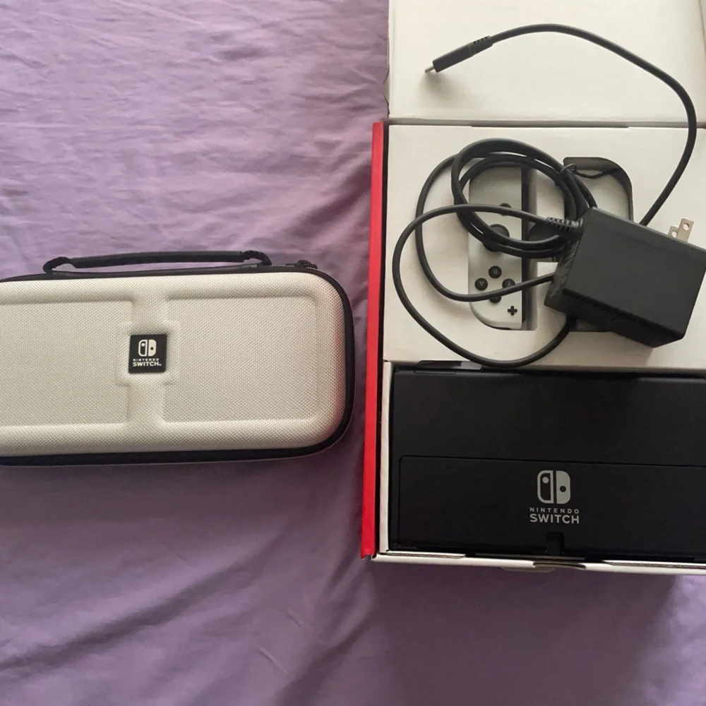 Nintendo Switch with Gray Joy-Con and Accessories